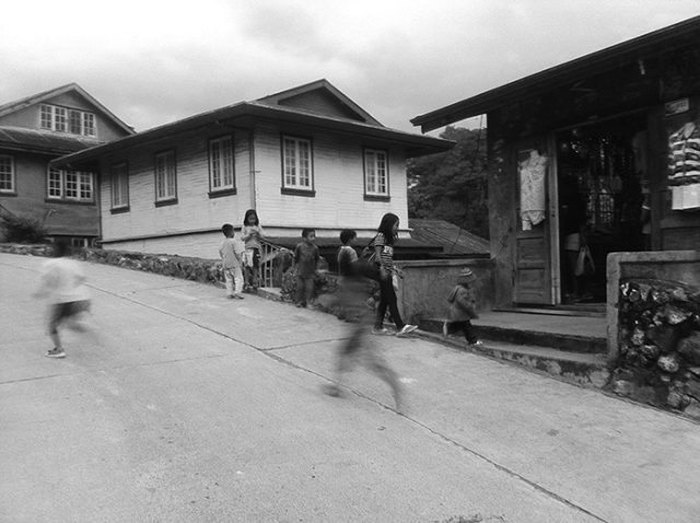 A camera phone's shutter speed and a practiced hand are no match for children bent on playing. (Sagada, Mountain Province)