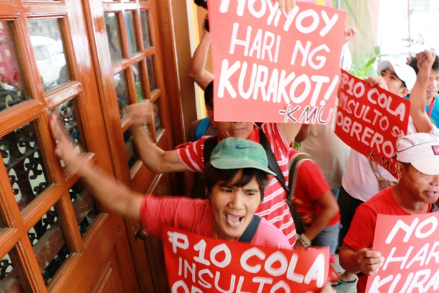 Workers knocking on labor departments' doors, Sept 10, 2013 (Photo by Jhun Dantes / www.bulatlat.com)