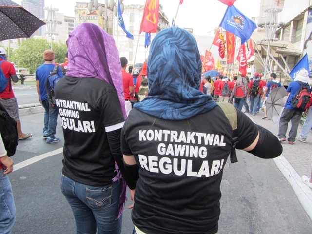 Patricia and Camille, contractual workers in an electronics firm, join Labor Day march to Mendiola (Photo by M. Salamat)