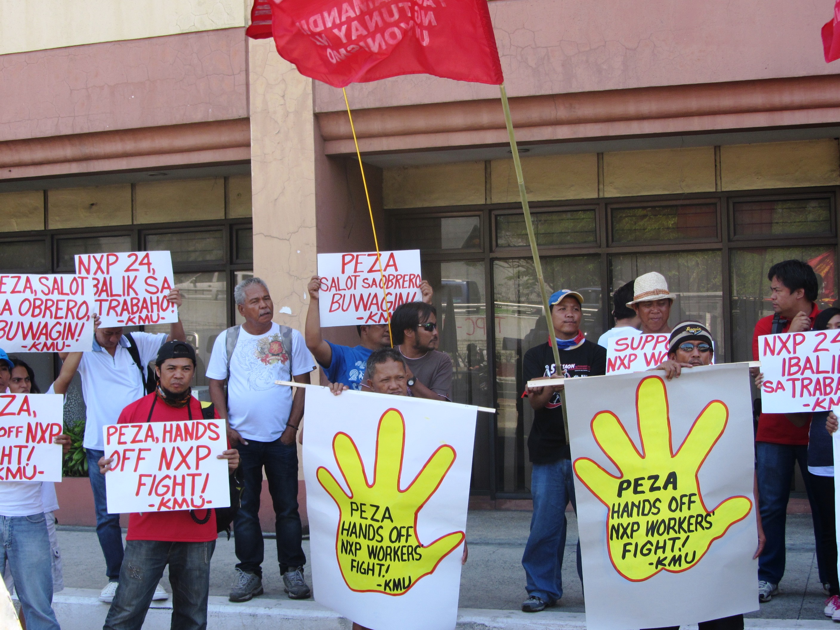 Workers denounce PEZA's creation of 'safe haven' for investors, May 12 (Photo by M. Salamat)