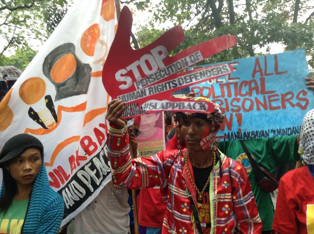 Lakbayanis call on the DOJ to dismiss false charges against activists. (Photo by J. Ellao / Bulatlat.com)