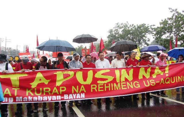 Protesters brave heavy downpour, defy security barriers to deliver ‘real SONA’