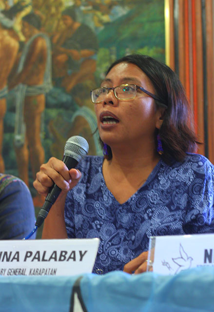 Cristina Palabay, secretary general of Karapatan, presents the trends in the human rights situation under the Aquino administration in a press conference, Nov. 5. (Photo by Ronalyn V. Olea/ Bulatlat.com)