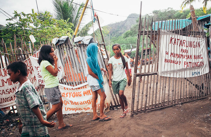 The entrance to the main campsite in Bgy Sta Mercedes, one of the four campsites the community put up to guard their position from impending threat and harassment by the police, the military and the security guards of the M.T.V. Corporation and MSDC of Henry Sy. (Photo by Selina Gabriel / Bulatlat)
