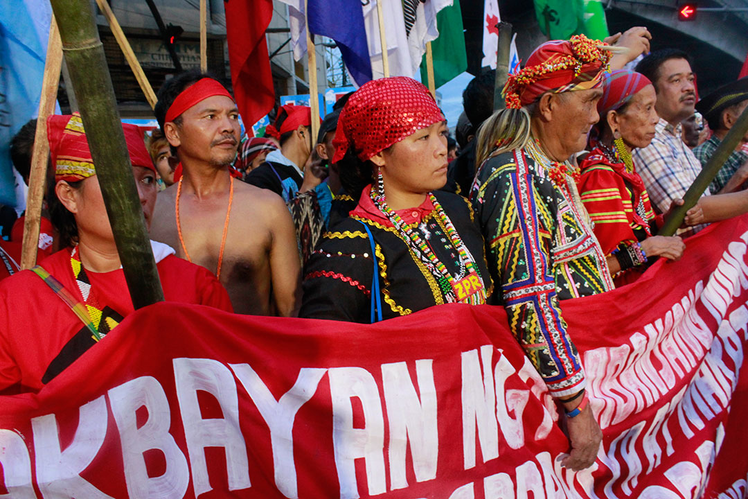 Indigenous peoples in the Philippines demand the repeal of anti-indigenous peoples laws in a protest caravan dubbed “Lakbayan (Journey) of National Minorities for Self Determination and Just Peace.” (Photo by Ken Bautista) 