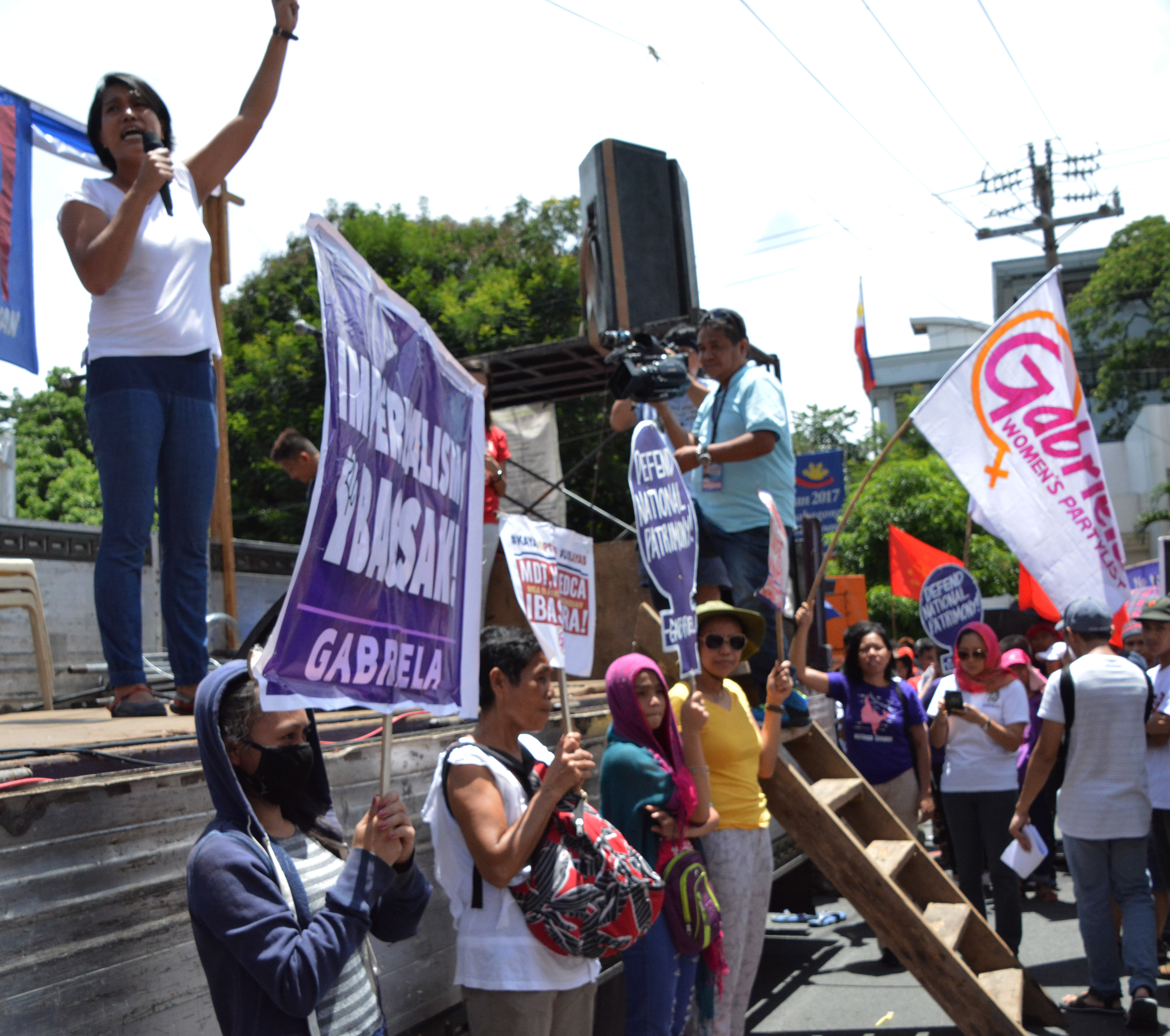 Joms Salvador of Gabriela (extreme left) (Photo by Mary Angelique Tacata/Bulatlat)