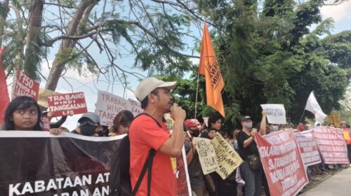 Workers and supporters hold a protest against the dismissal of workers outside the Wyeth factory in Canlubang Laguna, May 22. (Photo by Justin Umali)