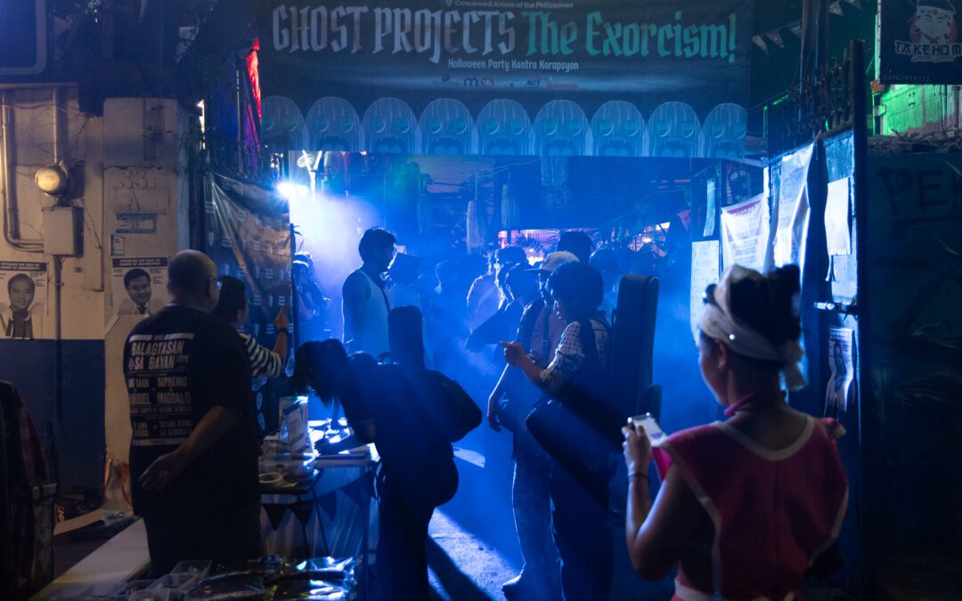 Artists haunt the corrupt in Halloween-themed protest