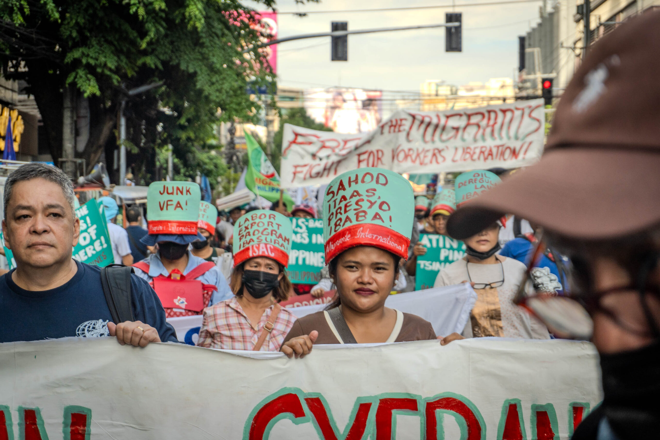 Groups march alongside workers commemorating this year’s labor day